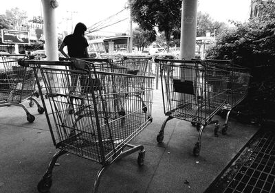 Woman standing on sidewalk