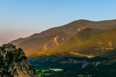 Scenic view of mountains against clear sky