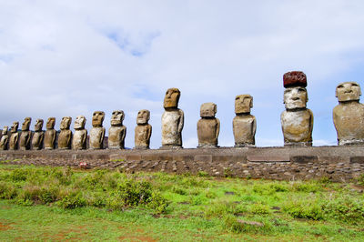 Old sculptures against sky