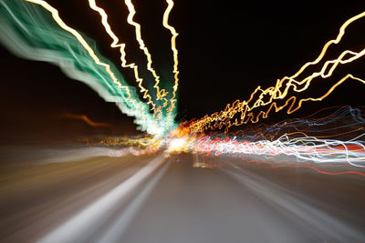 Light trails on road at night