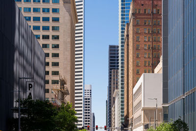 Low angle view of buildings against clear sky