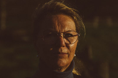 Close-up portrait of woman in eyeglasses