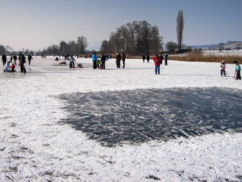 People on frozen lake