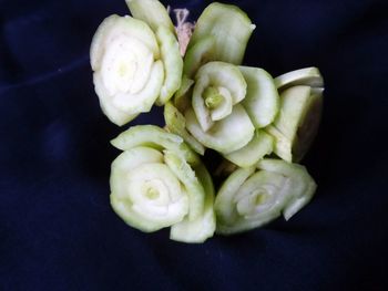 High angle view of rose bouquet against black background