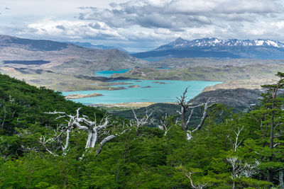 Scenic view of landscape and mountains against sky