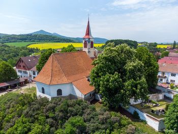 High angle view of trees and buildings against sky