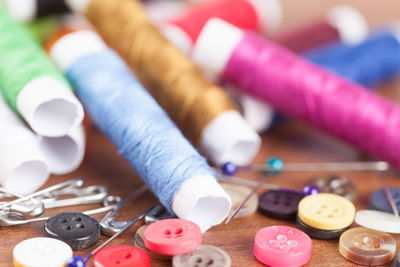 Close-up of sewing items on table