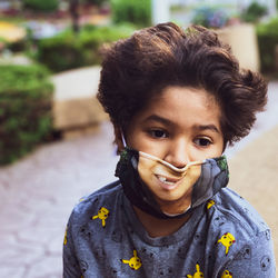 Close-up of boy with mask