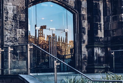 Reflection on glass door of building