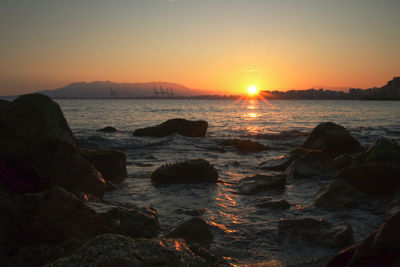 Scenic view of sea against sky during sunset