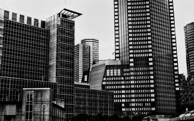 Low angle view of skyscrapers against sky