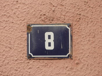 Close-up of number 8 on wall