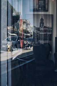 Empty chairs and tables in city