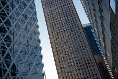 Low angle view of skyscrapers against sky