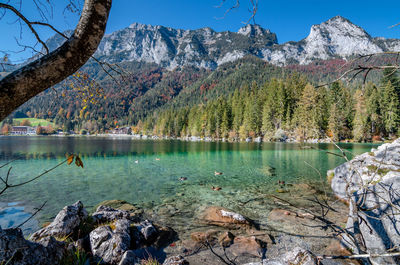 Scenic view of lake against sky during winter