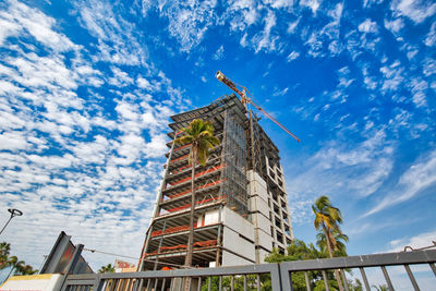 Low angle view of building against blue sky