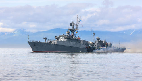 Russian warship going along the coast of pacific ocean