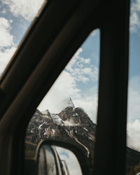 Low angle view of car against sky