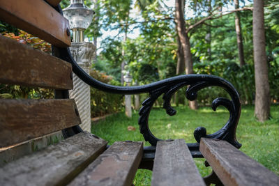 Close-up of bench in park