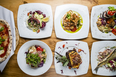 High angle view of food served on table