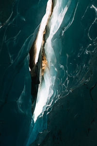 Low angle view of ice in cave