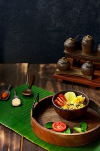 High angle view of fruits in plate on table