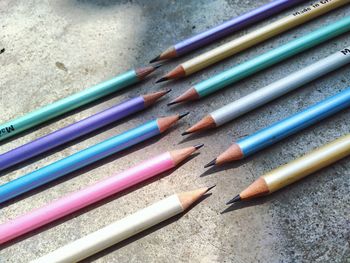 High angle view of colored pencils on table