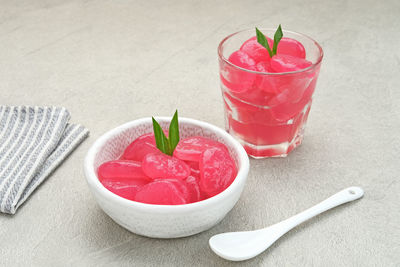 Manisan kolang-kaling, or preserved sugar palm fruit with red color