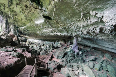 High angle view of rocks in cave