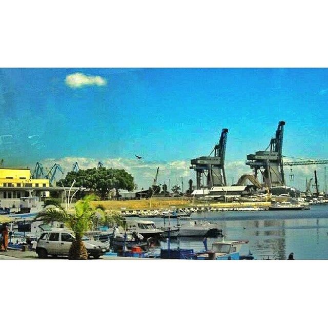 transfer print, blue, building exterior, built structure, architecture, nautical vessel, water, transportation, mode of transport, moored, auto post production filter, clear sky, boat, sky, sea, day, house, copy space, harbor, outdoors