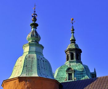 Low angle view of building against blue sky