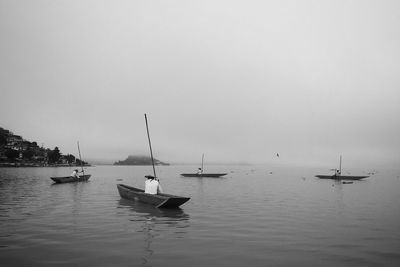 Boats sailing in sea