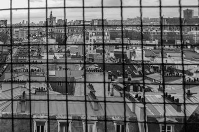 Full frame shot of building with city in background