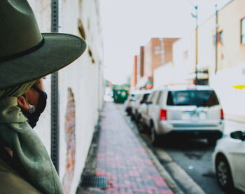 Portrait of man on street in city