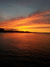 Scenic view of sea at sunset