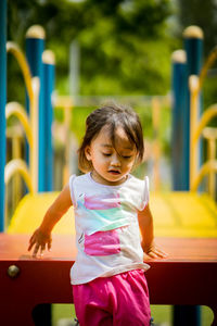 Cute girl playing at playground