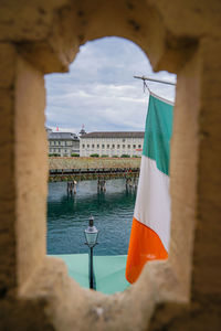 Flag on boat in city