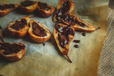 High angle view of pears with chocolate on table