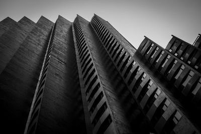 Low angle view of modern office building against sky