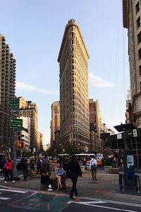 People walking on city street