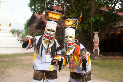 Full frame shot of traditional mask against trees