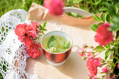 High angle view of pink roses on table