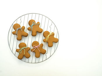 Close-up of cookies against white background