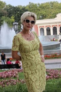 Young woman wearing sunglasses standing outdoors