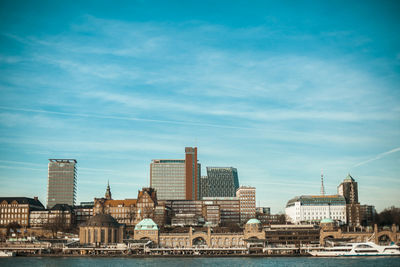 Buildings in city against sky