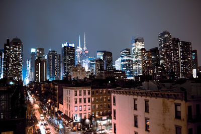 View of city lit up at night