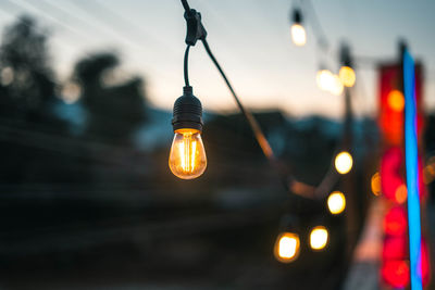 Close-up of illuminated light bulb