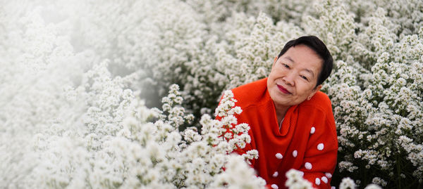 Portrait of a smiling young woman in winter