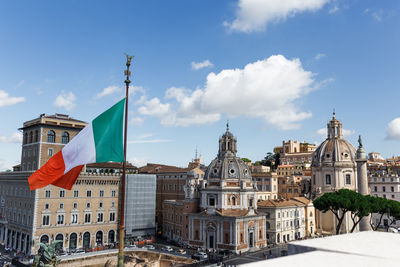 Buildings in city against sky