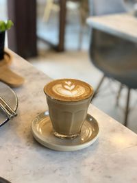 Coffee cup on table